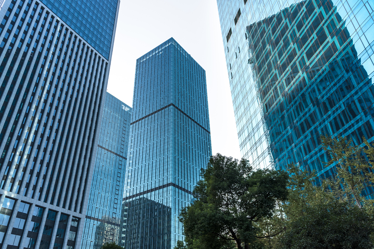 Glass office towers viewed from street level